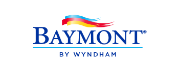 Baymont by Wyndham logo, featuring 3 flag graphics blowing in the wind: red, yellow, and blue.